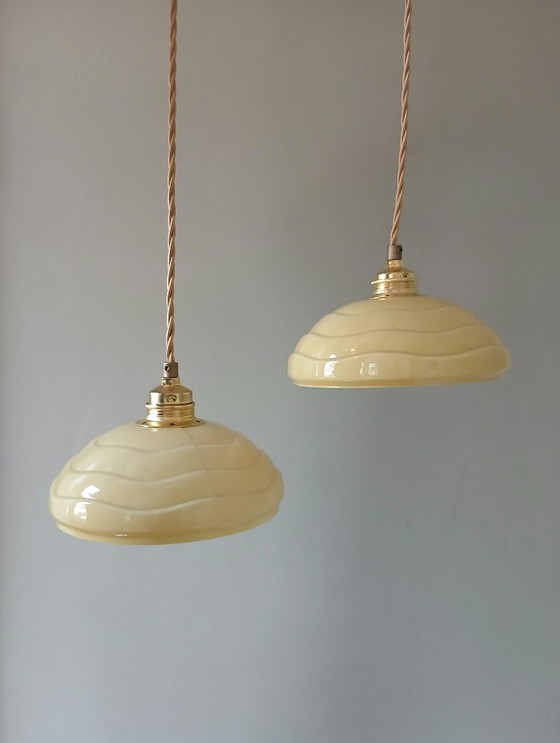 Image 1 of Set (2) Antique ceiling lamps in pastel brown/yellow color.