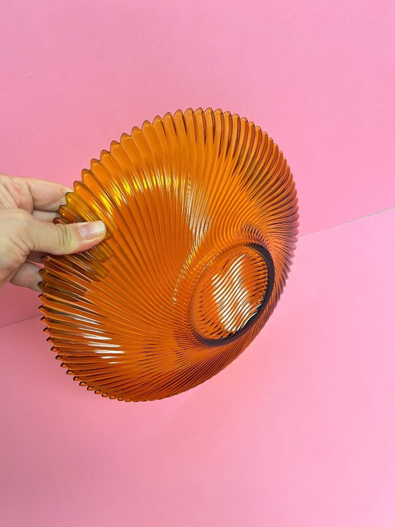 Image 1 of Vintage 70s swirl amber glass amber sunburst fruit bowl sawtooth edge orange