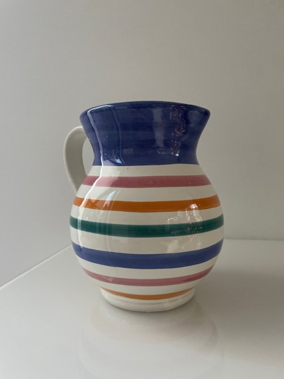 Image 1 of Handgemaakte vintage schenkkan met kleurrijke strepen