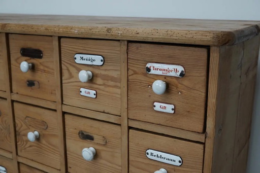 Antique German pine apothecary cabinet with enamel plaques, 1900s