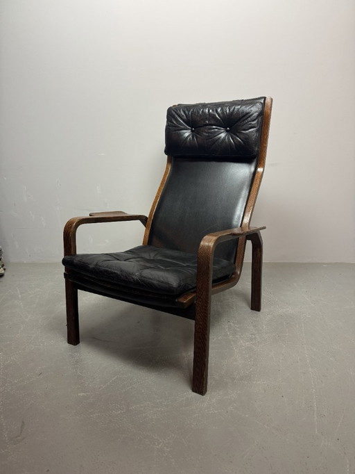 Poltrona lounge in pelle nera 'Lamino' modello P583 di design di metà secolo di Yngve Ekström per Swedese, Svezia, anni '60.