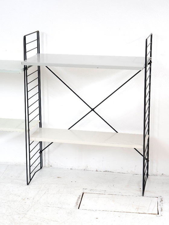 Image 1 of Estante de piso Tomado