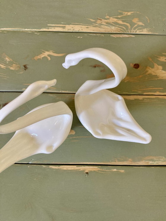 Image 1 of Pair of decorative swans handcrafted from opaque glass