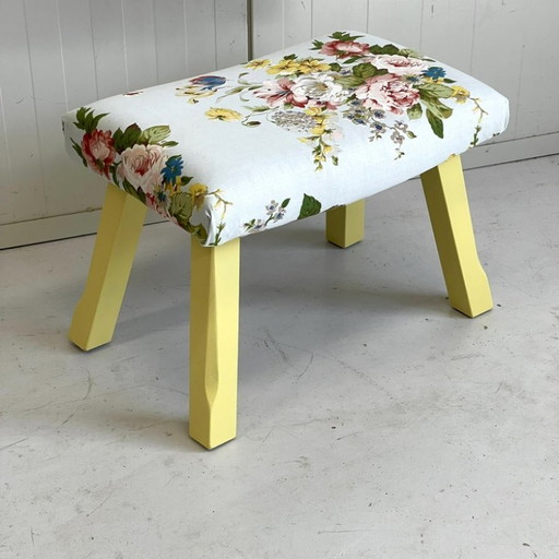 Reupholstered vintage ottoman pastel