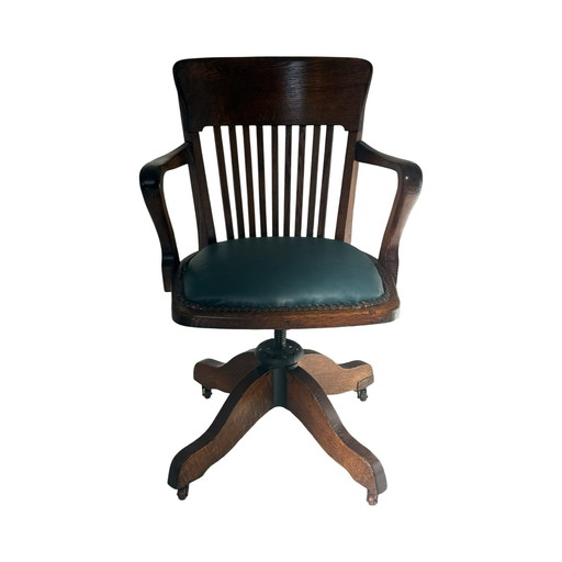 Silla de capitán de madera curvada - Montada sobre una base giratoria - Asiento verde, base de hierro fundido