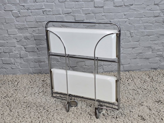 Image 1 of Vintage Foldable and Mobile Chrome Steel ‘Dinett’ Serving Trolley with 2 White Layers by Gerlinol, Germany, 1970s. 