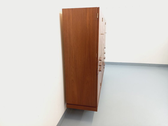 Image 1 of Tall, modernist, vintage Scandinavian sideboard in teak and black metal from the 1960s