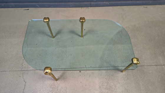 Image 1 of Salontafel van messing en glas, jaren 70.