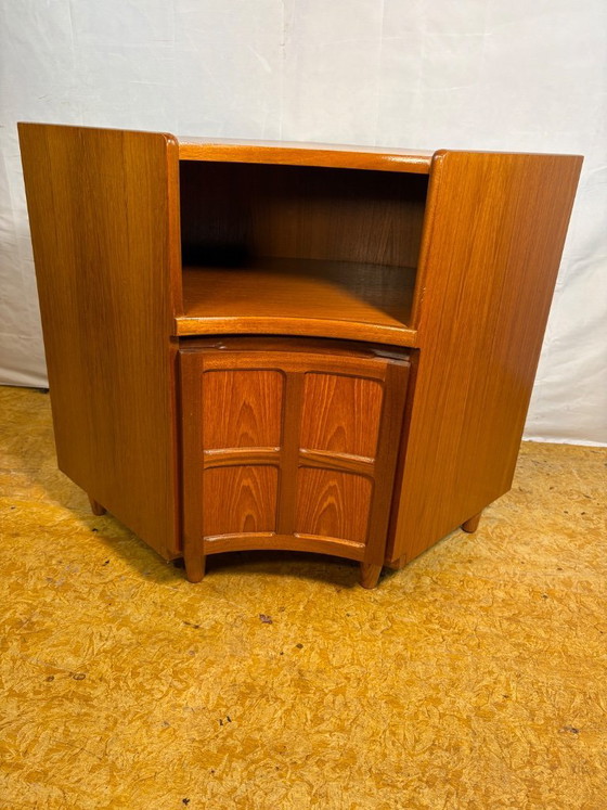 Image 1 of Vintage Nathan Teak Corner Cabinet (c. 1960s–1970s) – Mid-Century Modern  A beautiful and highly practical vintage teak corner c