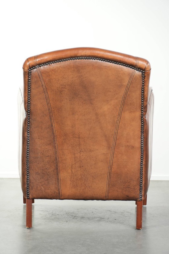 Image 1 of Beautiful sheepskin armchair in Art Deco style with wooden armrests