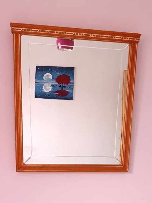 Wall mirror with beveled glass and solid wood frame