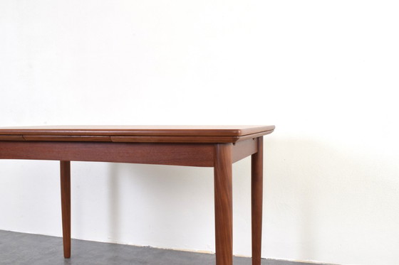 Image 1 of Table de salle à manger extensible en teck danois, style milieu du XXe siècle, années 1960.