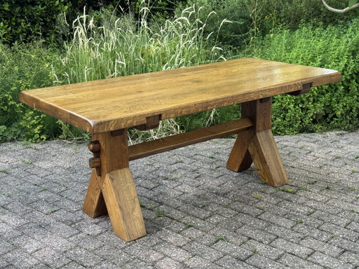 Brutalist oak dining table by De Puydt