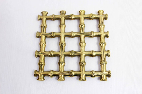 Image 1 of Onderzetter van imitatie bamboe en messing