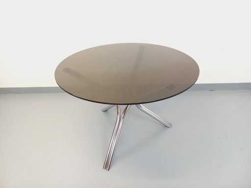Vintage round dining table in plexiglass, smoked glass type, and chrome-plated metal, Space Age style from the 70s
