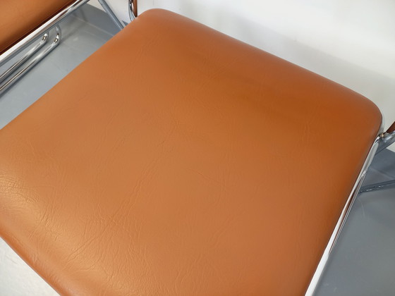 Image 1 of Set di 4 sedie a slitta vintage degli anni '70 in metallo cromato e similpelle color cognac