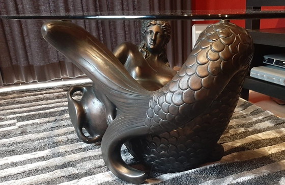 Image 1 of Bronze-colored mermaid coffee table with glass top