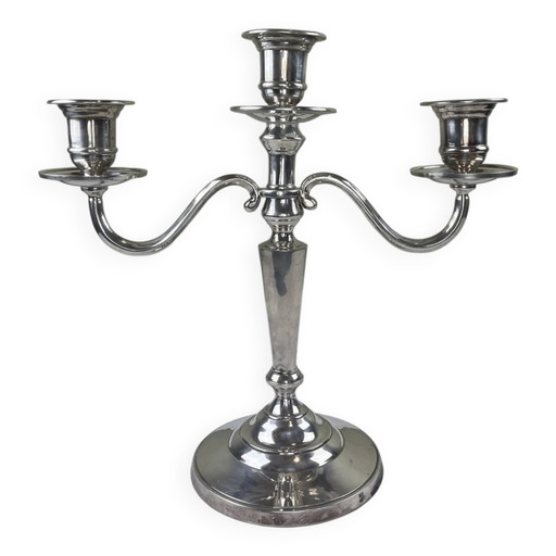 Portavelas de metal plateado con 3 luces