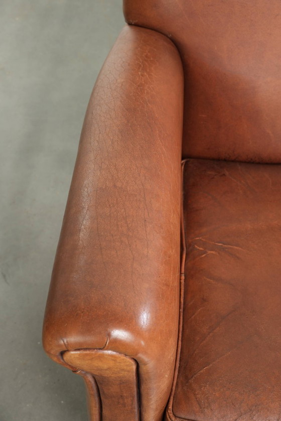 2x Fauteuils en cuir de mouton beaux et confortables avec de belles couleurs et un design intemporel (photo 7 of 14)