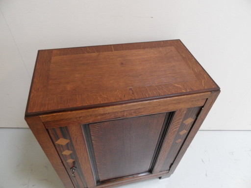 Art Deco one-door cabinet Amsterdam School