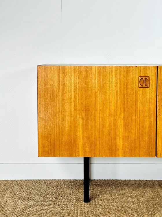 Image 1 of Minimalist Scandinavian sideboard in teak with black metal legs, 1960
