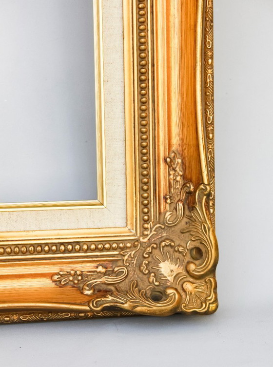 Image 1 of Antique Baroque wooden frame, patinated with gold leaf, handmade, Louis XVI style. Baroque frame for a painting, mirror, etc.