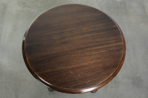 Image 1 of Antieke Engelse pub/ bistro/ bijzettafel uit de 19e eeuw met een gietijzeren onderstel en een rond houten tafelblad