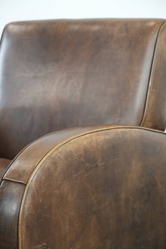 Image 1 of Poltrona in pelle di pecora dal design elegante e dalle belle forme rotonde