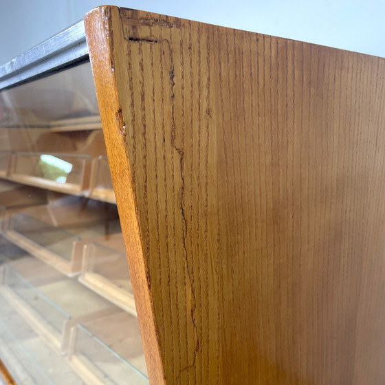 Image 1 of Vintage counter with drawers and glass top