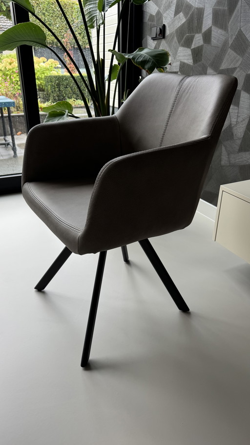 3 draaibare eettafelstoelen met leer bekleed