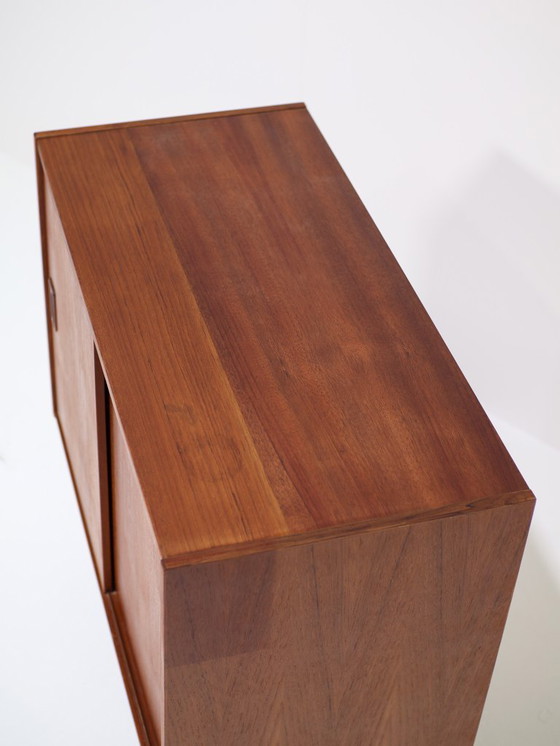 Image 1 of Danish vintage teak wood sliding door cabinet