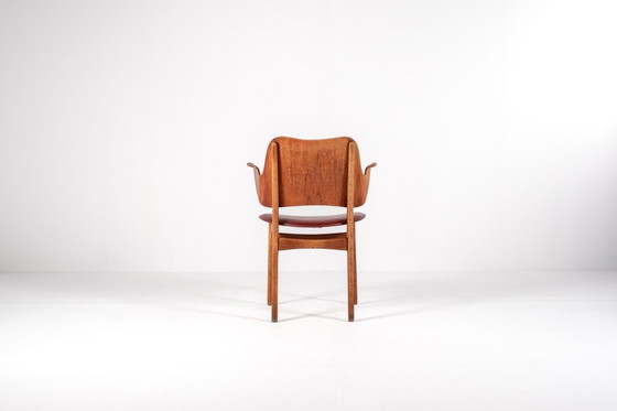 Image 1 of Model 107 Eiken & Teakhouten Fauteuil van Hans Olsen
