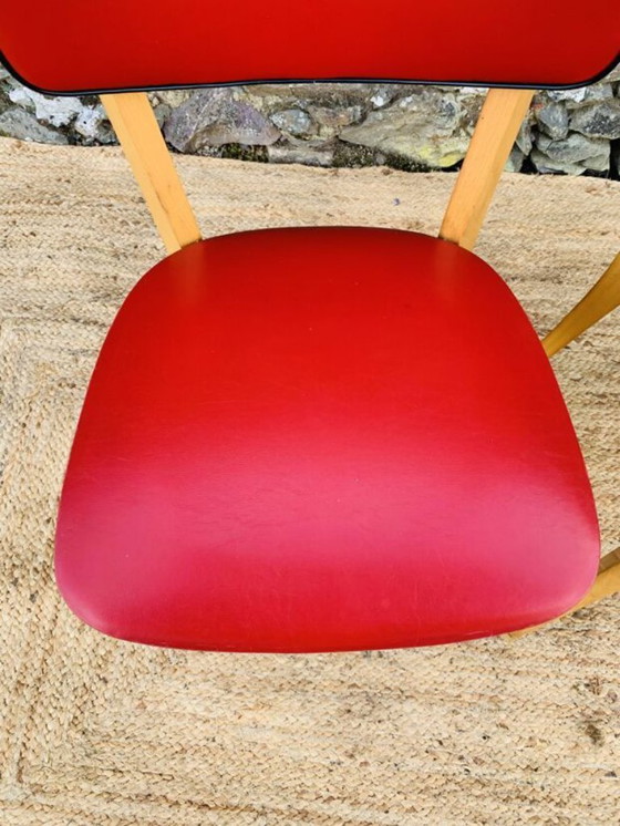 Image 1 of Ein Paar rote Stühle