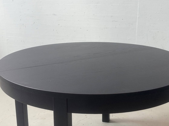 IKEA BJURSTA extendable dining table in black-brown – Wood (photo 6 of 14)