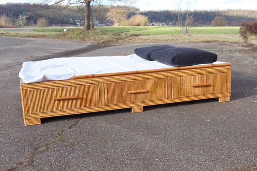 Vintage rattan bed by Audoux Minet