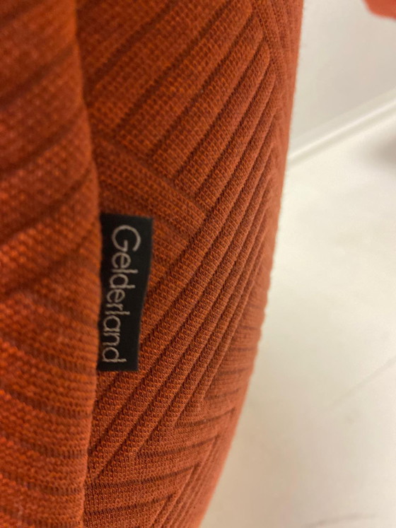 Image 1 of Gelderland 7405 swivel armchair with ottoman | burnt orange