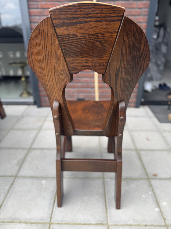 Image 1 of Brutalist eetstoelen (6st) en eettafel