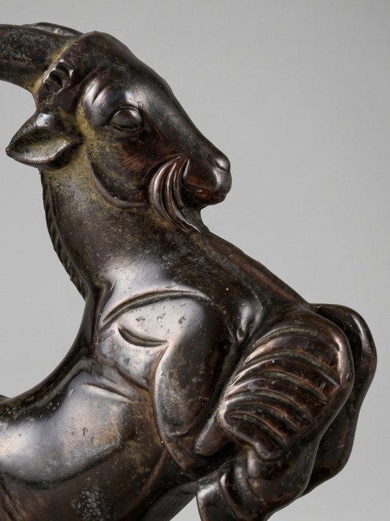 Image 1 of Serre-livres Art Déco bouquetins en régule patiné sur socle marbre taupe – paire années 1930