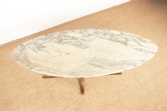 Image 1 of Oval coffee table in Carrara marble and rosewood by Hugues Poignant 1960.