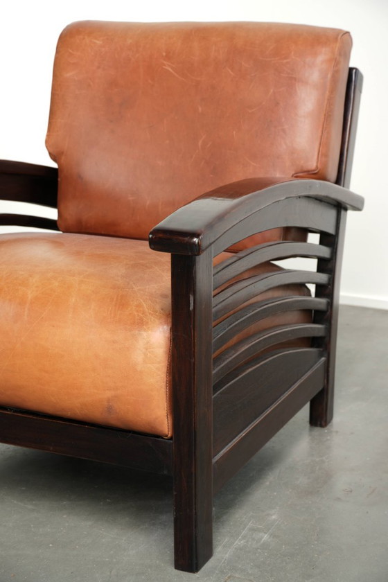 Elegant cowhide armchair with beautiful details in timeless Art Deco design – Leather, Klassiek (photo 9 of 12)