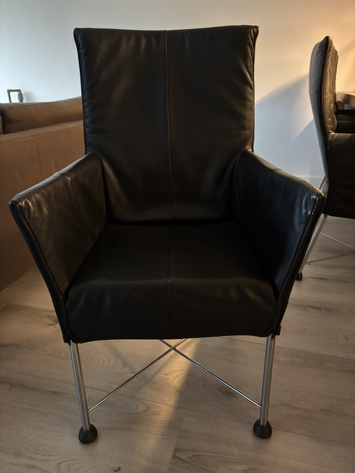 6 zwarte Montis Chaplin stoelen met rvs onderstel