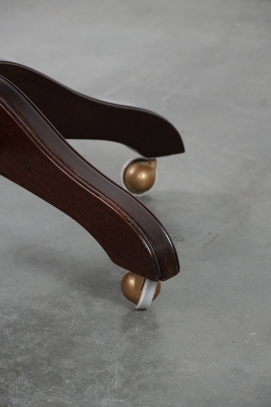 Image 1 of Zwarte, tijdloze, chesterfield bureaustoel gemaakt van rundleer en hout op wieltjes