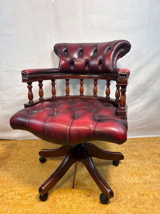 Vintage Burgundy Leather Chesterfield Swivel Office Chair on Wheels  Add a touch of sophistication to your workspace with this v