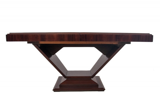 Image 1 of  zoom_in Original walnut extendable table, designed by Louis Majorelle, with 6 Art Deco chairs.