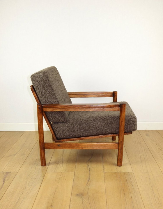 Image 1 of Houten fauteuil ontworpen door Z. Baczyk, bruin vintage chocoladebruin bouclé lamsleer