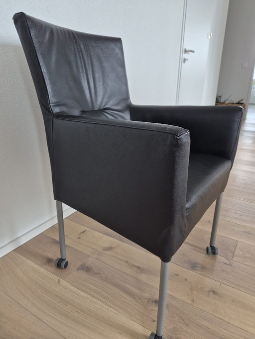 4 schwarze Ledersessel