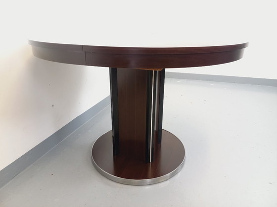 Image 1 of Table ronde de repas vintage en bois d’ébène et métal chromé style Space Age / Diner des années 70 avec rallonge intégrée