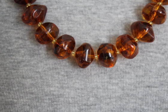 Image 1 of Vintage Bakelite/Catalin necklace in amber look with asymmetrical beads