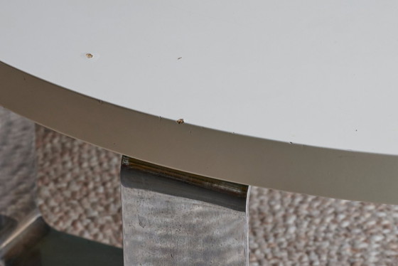 Image 1 of Table basse futuriste - structure en acier inoxydable