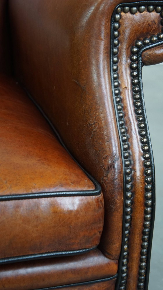 Image 1 of Grote vintage schapenleren oorfauteuil